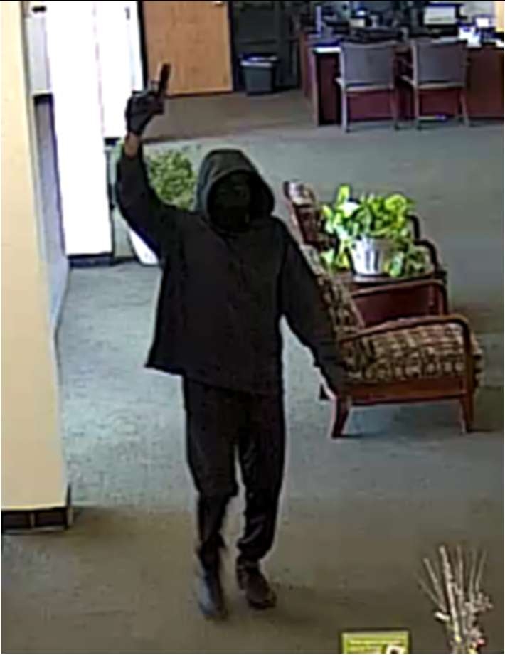 Still photo of Guliford with gun