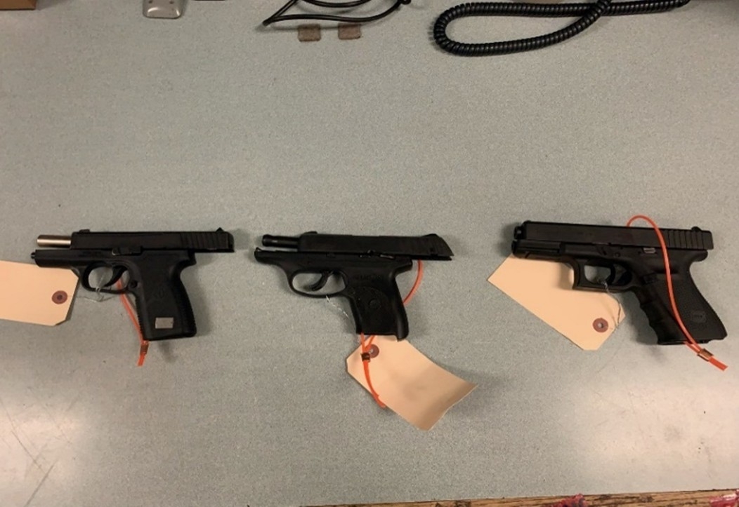 3 seized handguns, tagged