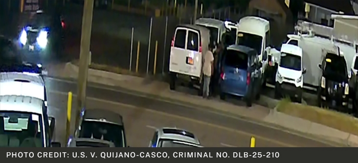 Surveillance Image of Defendants Approaching the Vehicle
