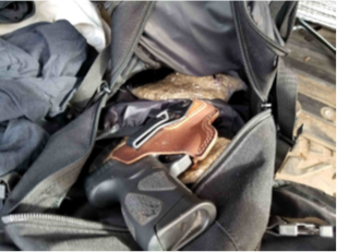 Firearm in black bag