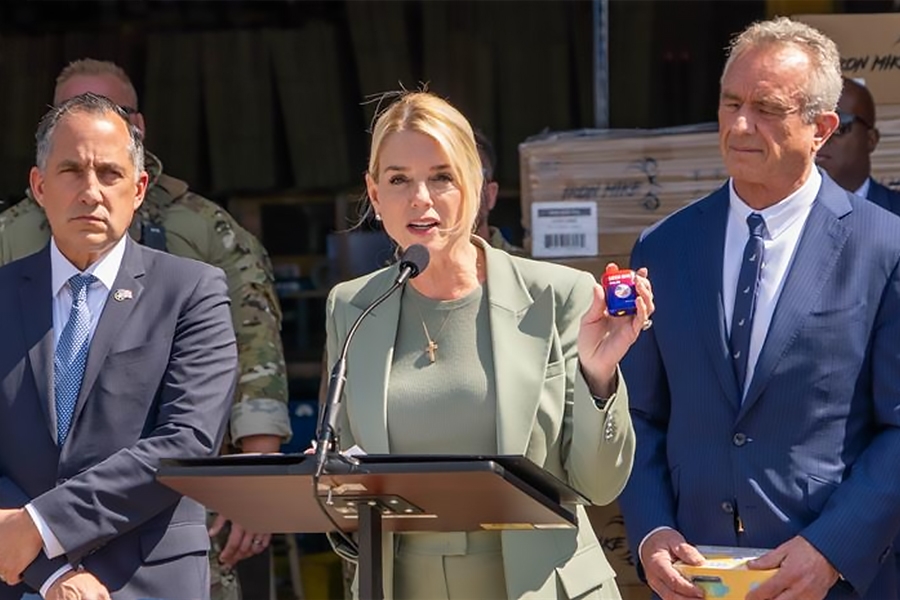 Attorney General Pamela Bondi delivers remarks from a podium in front of a vape products distribution center in Chicago, Illinois. She is joined by HHS Secretary Kennedy and federal government officials. Attorney General Pamela Bondi delivers remarks from a podium in front of a vape products distribution center in Chicago, Illinois. She is joined by HHS Secretary Kennedy and federal government officials.