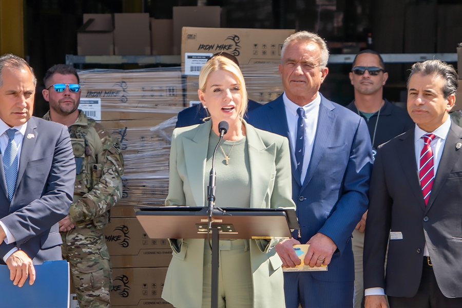 Attorney General Pamela Bondi delivers remarks from a podium in front of a vape products distribution center in Chicago, Illinois. She is joined by HHS Secretary Kennedy and federal government officials. Attorney General Pamela Bondi delivers remarks from a podium in front of a vape products distribution center in Chicago, Illinois. She is joined by HHS Secretary Kennedy and federal government officials.