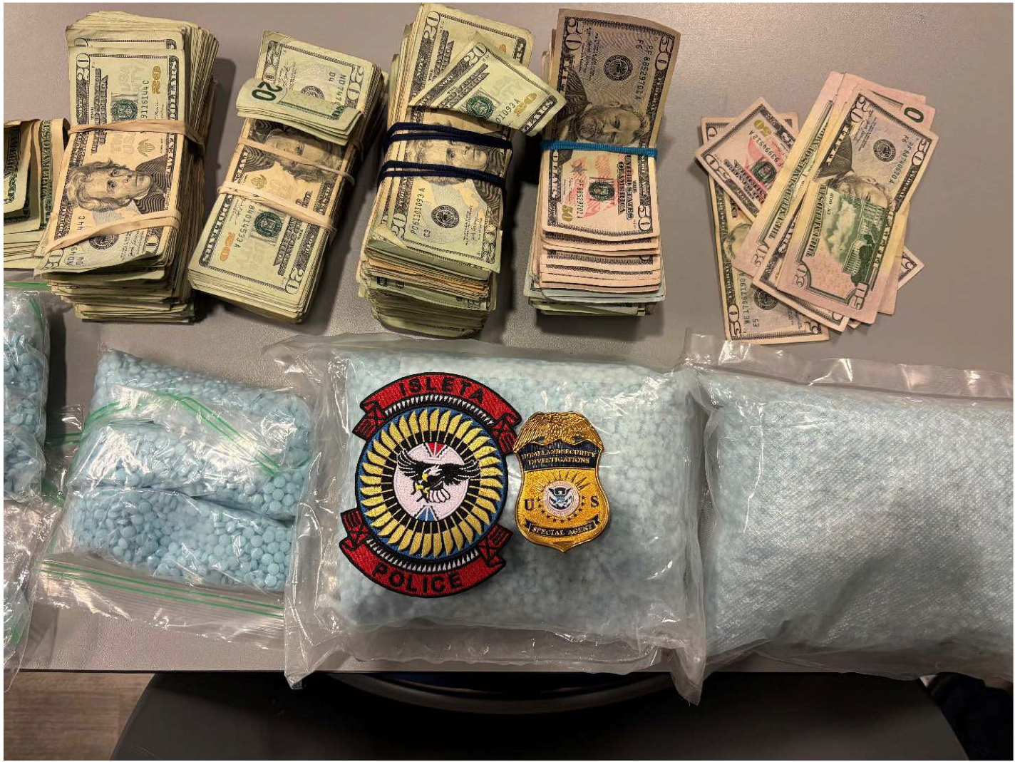 U.S. currency and fentanyl seized from Holmes' vehicle