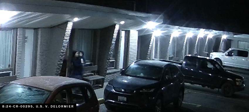 Mother and child departing room 140 at the Elect Inn walking towards Montour’s vehicle on March 29, 2023 at 3:21 a.m.