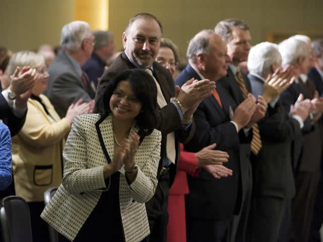 Assistant Attorney General Moreno applauds her collegues.