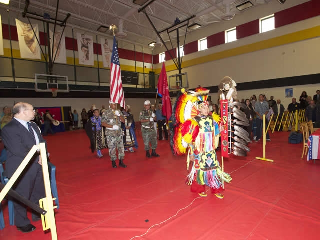 A young boy from Pine Ridge participates in exhibition dancing during the listening session on Pine Ridge Reservation.