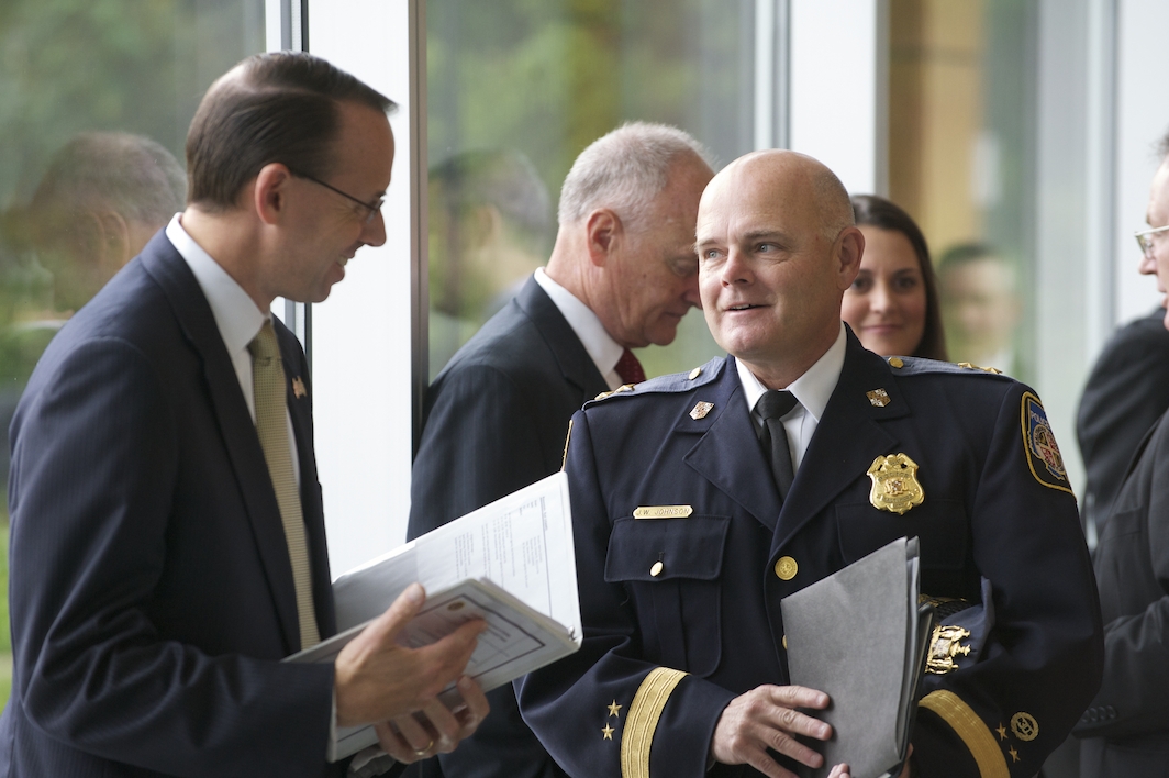 Participants mingle before hearing Attorney General Eric Holder discuss efforts to battle Intellectual Property theft at Towson University. Attorney General Eric Holder discusses efforts to battle Intellectual Property theft at Towson University.
