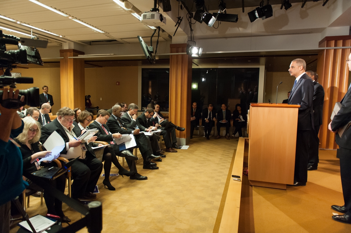 Attorney General Eric Holder addresses members of the media regarding the Department of Justice's civil lawsuit against the credit rating agency Standard & Poor's Ratings Services. Attorney General Eric Holder