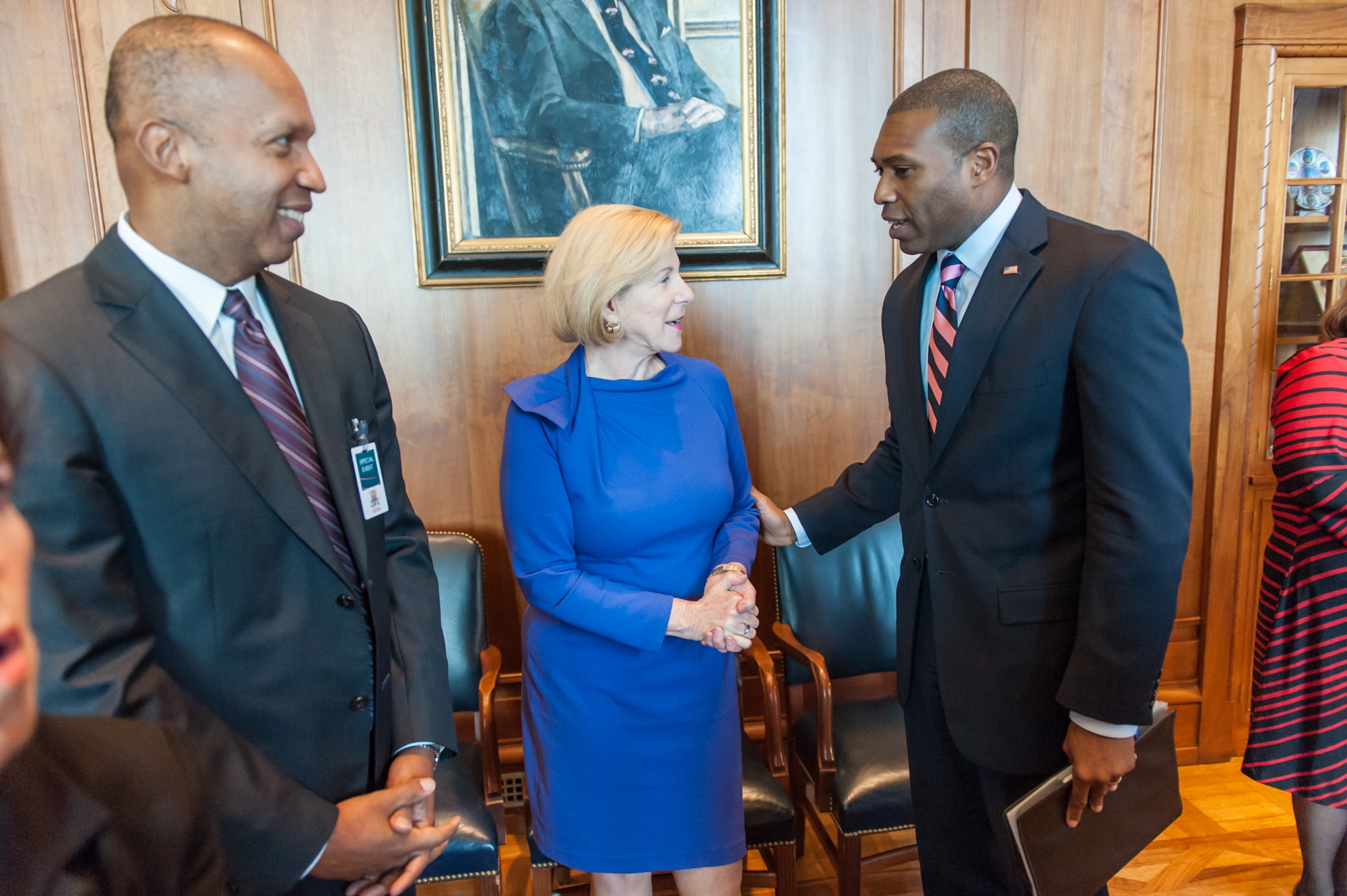 Acting Associate Attorney General greets NPR legal correspondent Nina Totenberg before the ceremony.