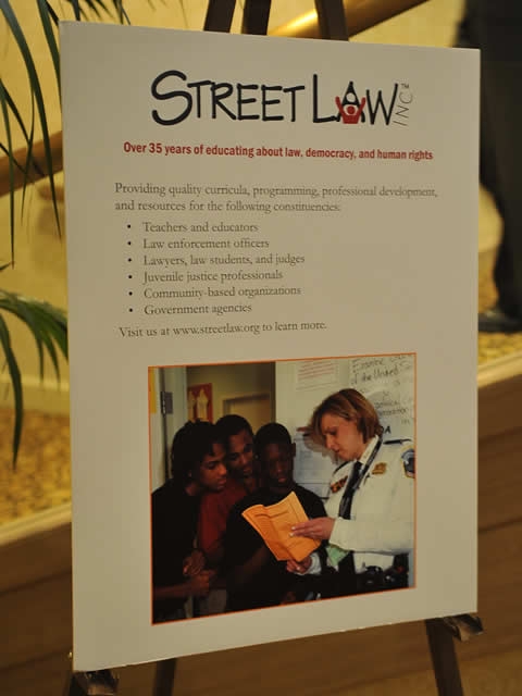 Street Law program information greeting awards dinner guests.
