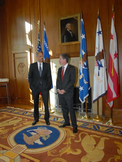 Attorney General Holder and Deputy Attorney General Cole converse and embark upon this new era of the Department’s history in the Attorney General’s conference room.