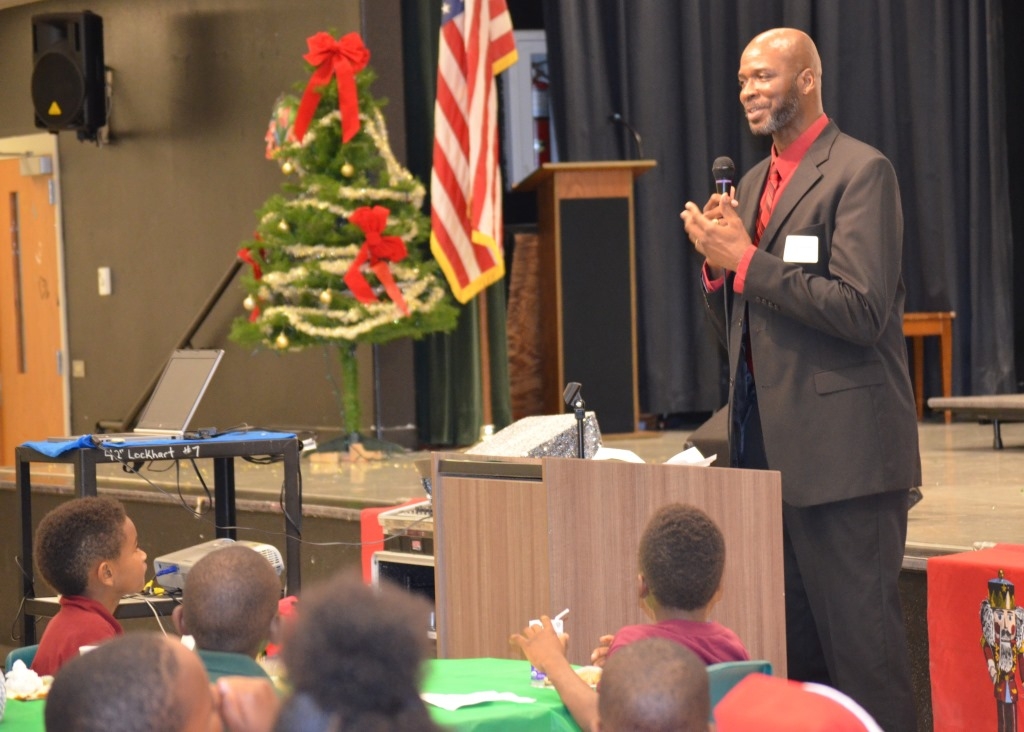 Mr. Ricky Gallon from the Boys and Girls Club of Tampa Bay speaks during the breakfast.