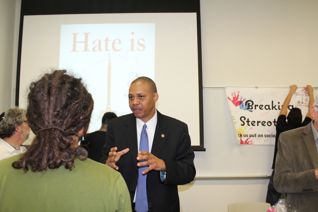 Mr. Daniels speaks with students.