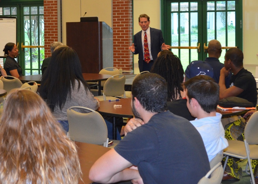 Dr. Kaplan addresses group.