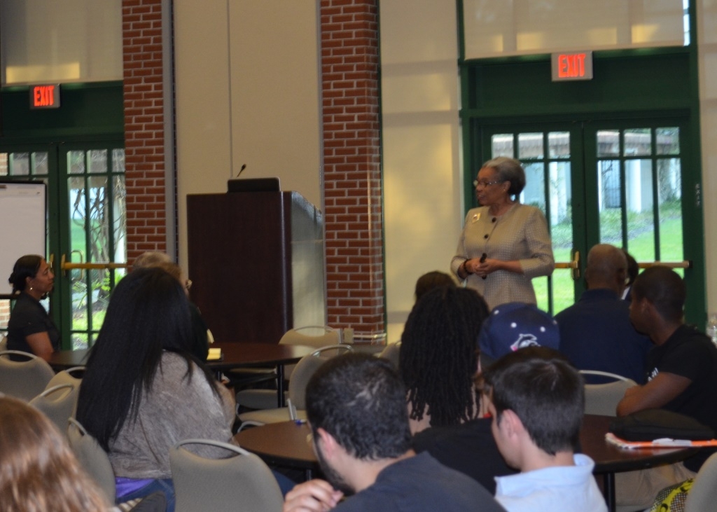 Dr. James speaks to the group.