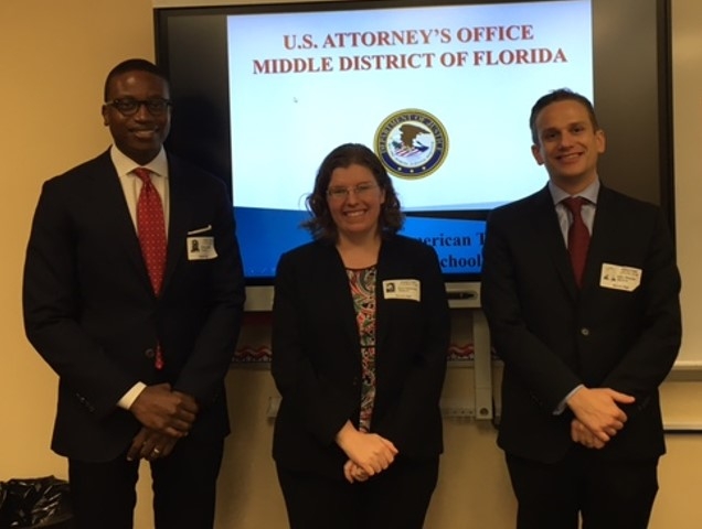 AUSAs Embry Kidd, Sara Sweeney and Sean Schecter at Boone High School
