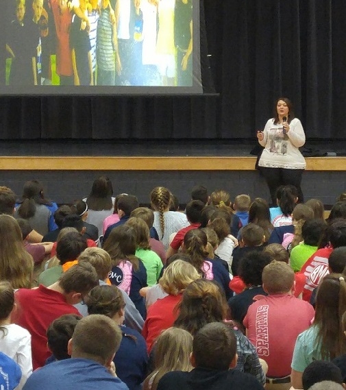 USA HEAT member Nikki Strunck shares her story with middle school students in Richmond