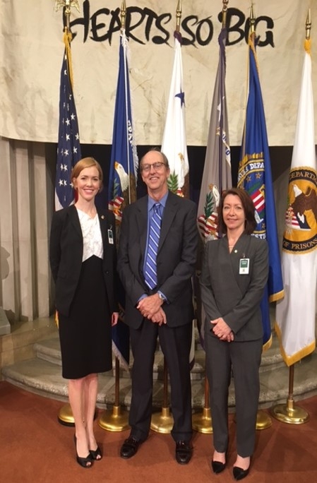 AUSAS Griffin and Corinis with Civil Chief Harwell in the Great Hall