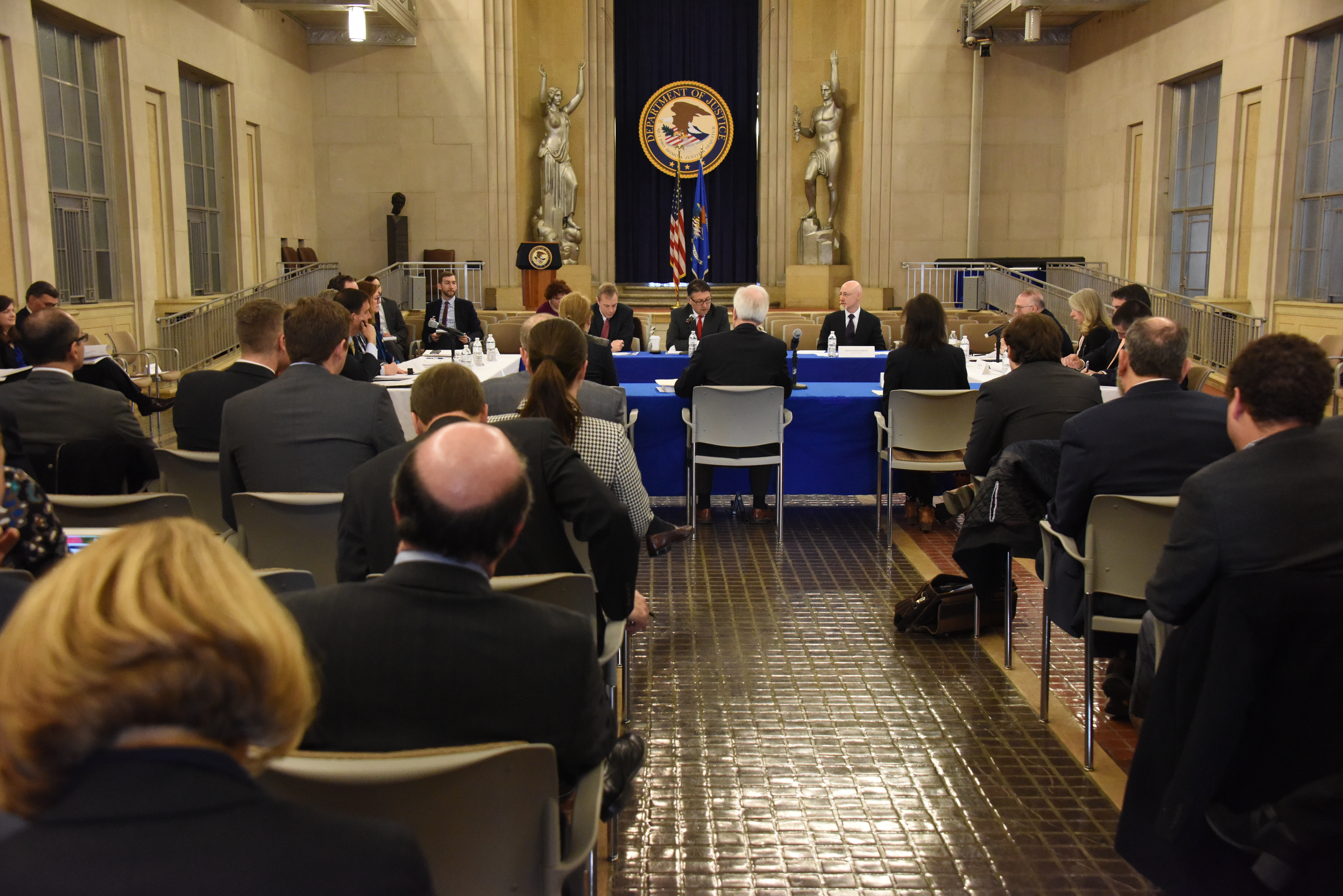 Antitrust Division staff, Roundtable Participants, and members of the public participating in the Public Roundtable Discussion Series on Deregulation &amp; Antitrust Law in the Great Hall of the Main Justice Building