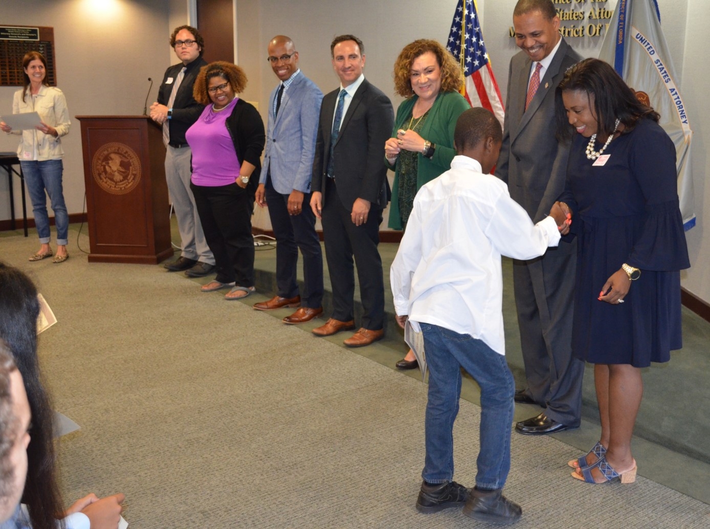 Mentors congratulate the students.