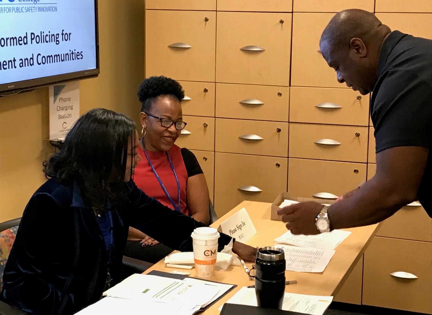 St. Petersburg College staff registers attendees.