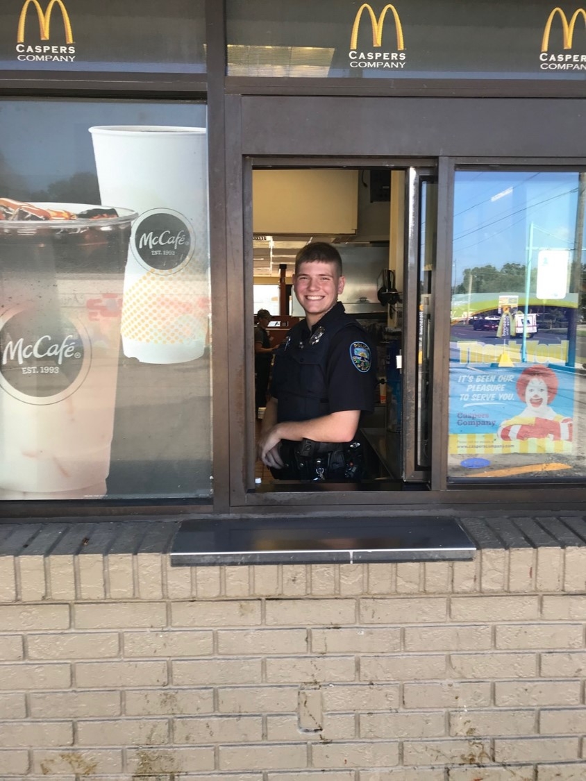 Gulfport PD engaging citizens in the drive-thru lane.