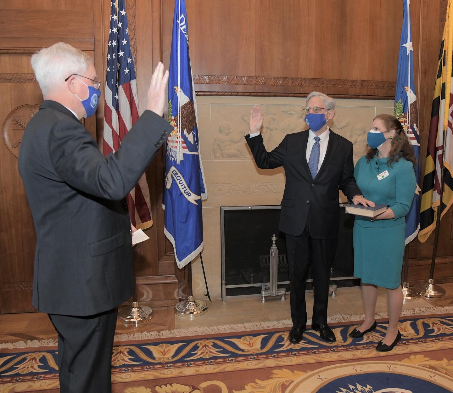Judge Garland takes his oath of office as the 86th Attorney General of the United States as he is sworn in by Assistant Attorney General for Administration Lee Lofthus.