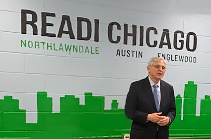 Attorney General Garland speaks with press at a READI Chicago meeting.