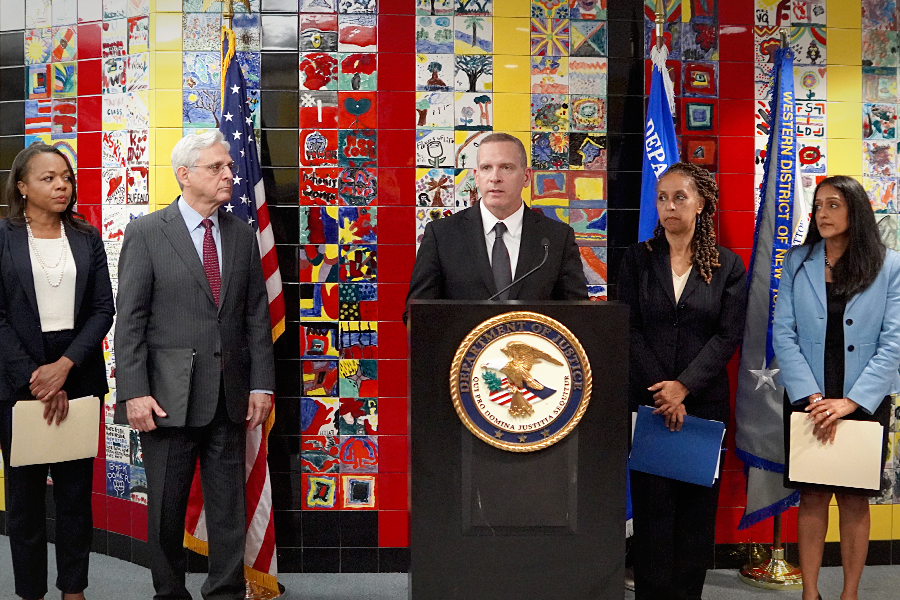 FBI Deputy Director Paul Abbate delivers remarks at a podium in Buffalo, New York.