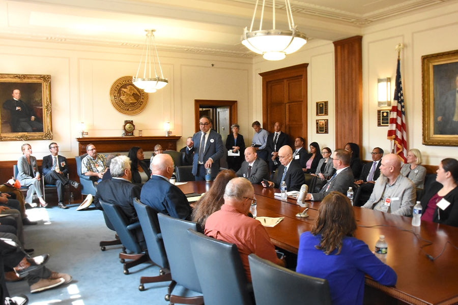 Assistant Attorney General of the Justice Department’s Antitrust Division Jonathan Kanter addresses the National Farmer’s Union (NFU) at RFK Main Justice building.