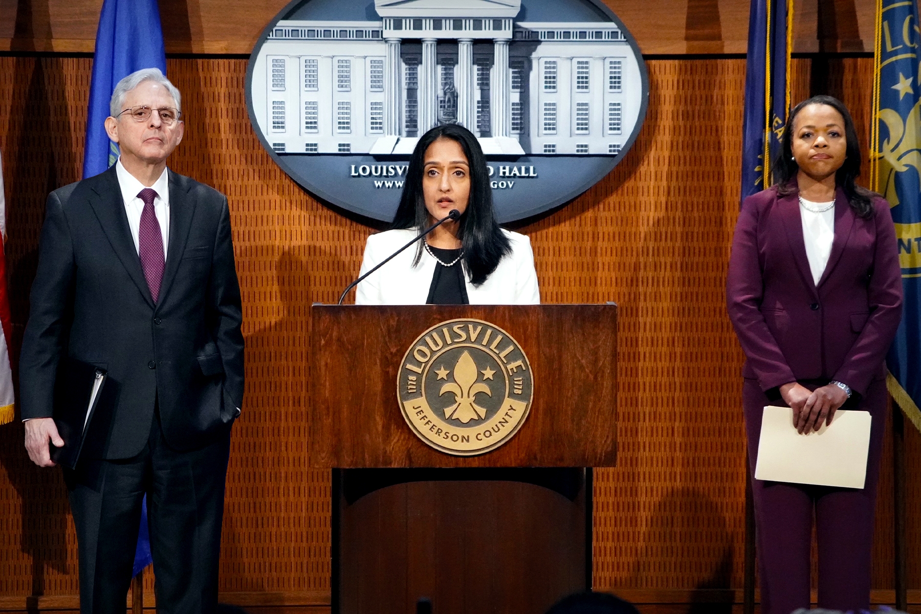 Associate Attorney General Vanita Gupta delivers remarks from a podium at the Louisville Metro Hall.