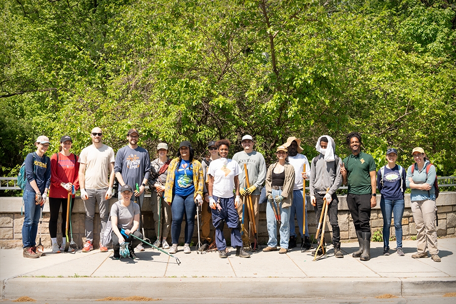 Volunteers for the 2023 Earth Day Cleanup at Marvin Gaye park pose for a photo.