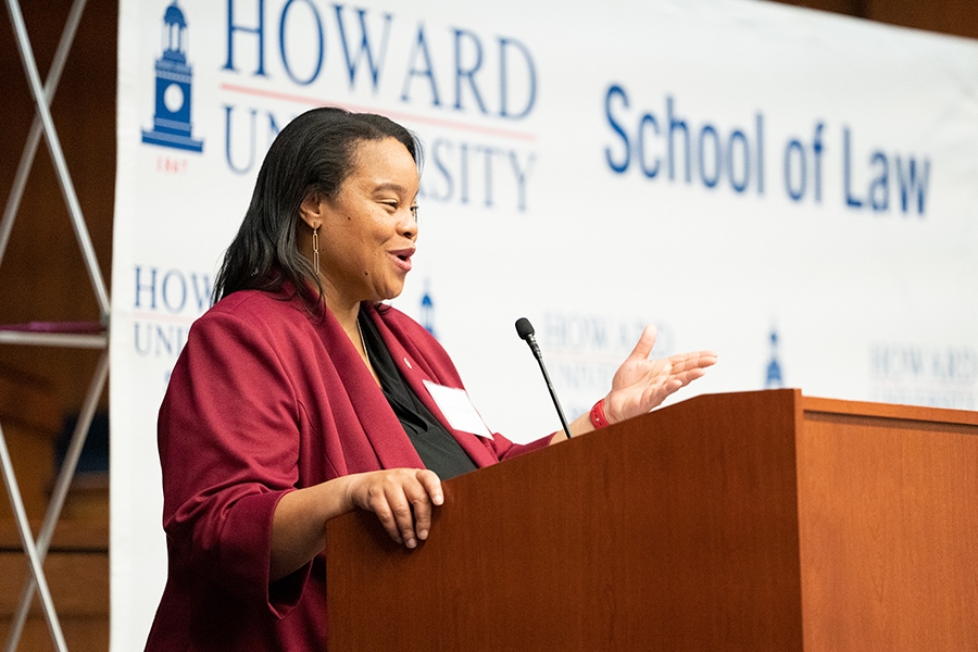 Howard School of Law Dean Danielle R. Holley delivers remarks from a podium at Howard University School of Law.