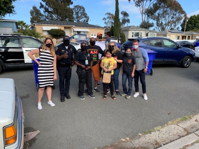 Our mentors dropping off goodies to our Success Agent students during the pandemic. 