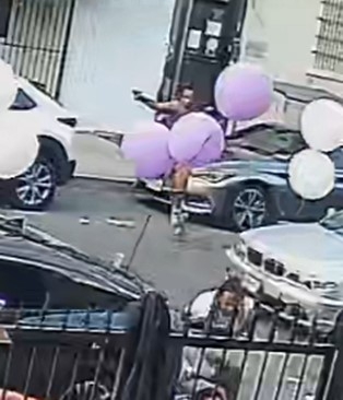 Photo of White holding a gun