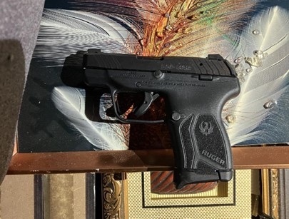 Photo of a gun recovered from the scene of the shooting