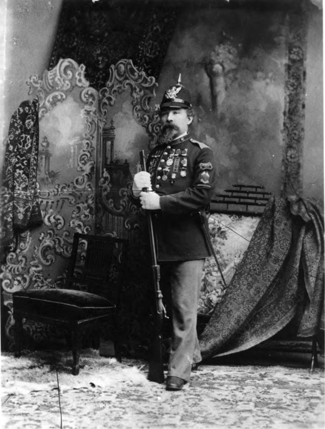 Photograph of Milan Bull wearing stolen medals