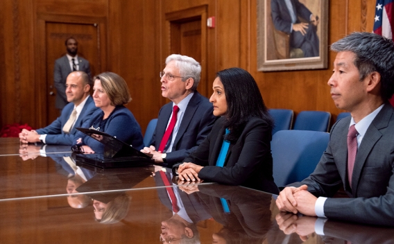 Attorney General Merrick B. Garland speaks among Justice Department officials in the Attorney General’s conference room