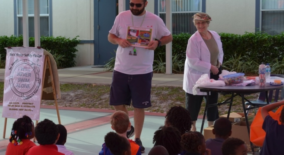 Lifeguards teaching water safety.