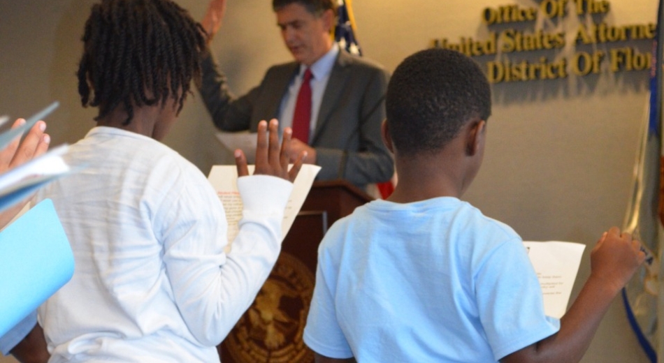 U.S. Attorney Bentley Administers the Gun Pledge.