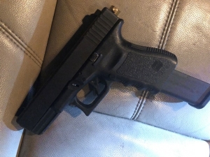 Photo of the handgun with an extended magazine. 