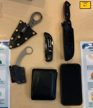 Four tactical/military style knives found on the defendant