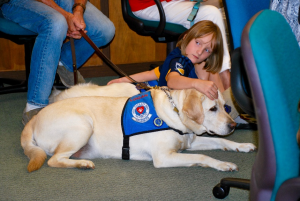 Therapy dog with child Therapy dog with child