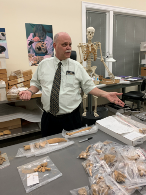 Dr. Hunt with bones