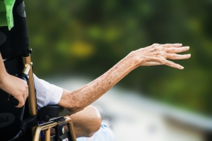 Elderly hand reaching