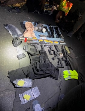 Picture of weapons and disguises seized Picture of weapons and disguises seized