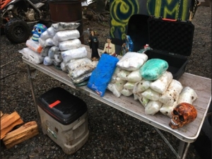 Drugs and cash on table