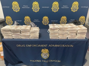 Packages of methamphetamine displayed on DEA table