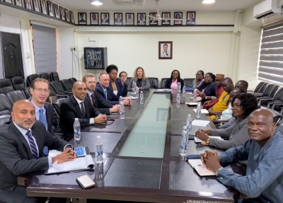 Deputy Assistant Attorney General Rao (left), Director of Administration, Assistant Commissioner of Police (ACP) Solomon Ayawine (right), Assistant Legal Attaché Justin Nwadiashi (third from left) and other officials from the Justice Department, FBI and the Ghana Police Service meet at the Ghana Police Service (GPS) headquarters in Accra, Ghana to discuss transnational cyber-enabled fraud.