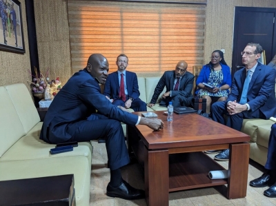 Deputy Assistant Attorney General Rao (center), Inspector General of Police in Togo Colonel Yaovi Okpaoul (left) and other officials from the Justice Department, FBI and La Police Nationale meet at the headquarters of La Police Nationale in Lomé, Togo, to discuss international law enforcement priorities.
